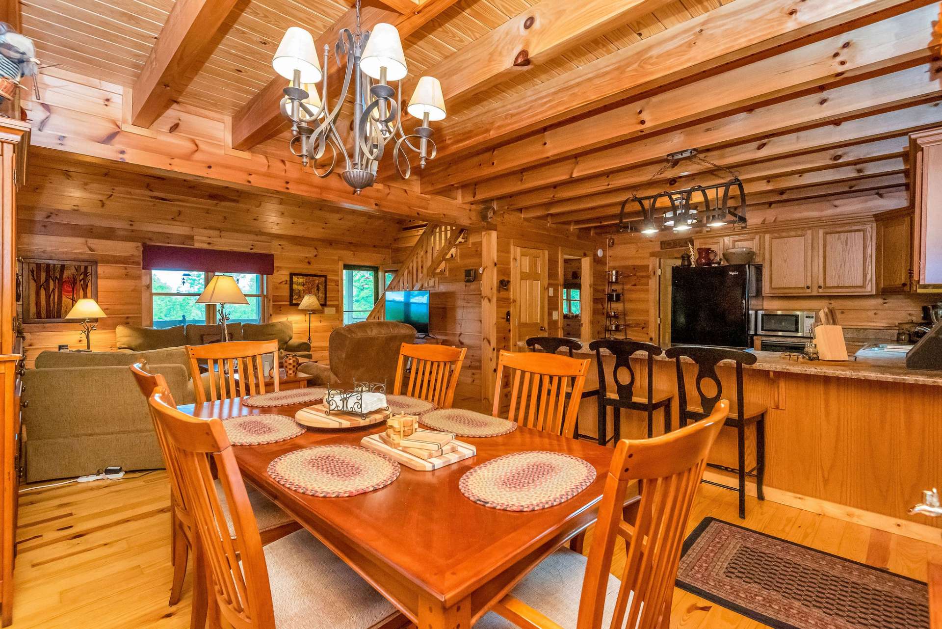 The great room offers a seamless blend of kitchen, dining, and living areas.